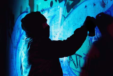 Banksy doing street art